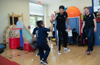 Players meet a young supporter.